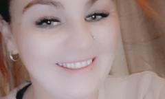 Leeann smiling at the camera